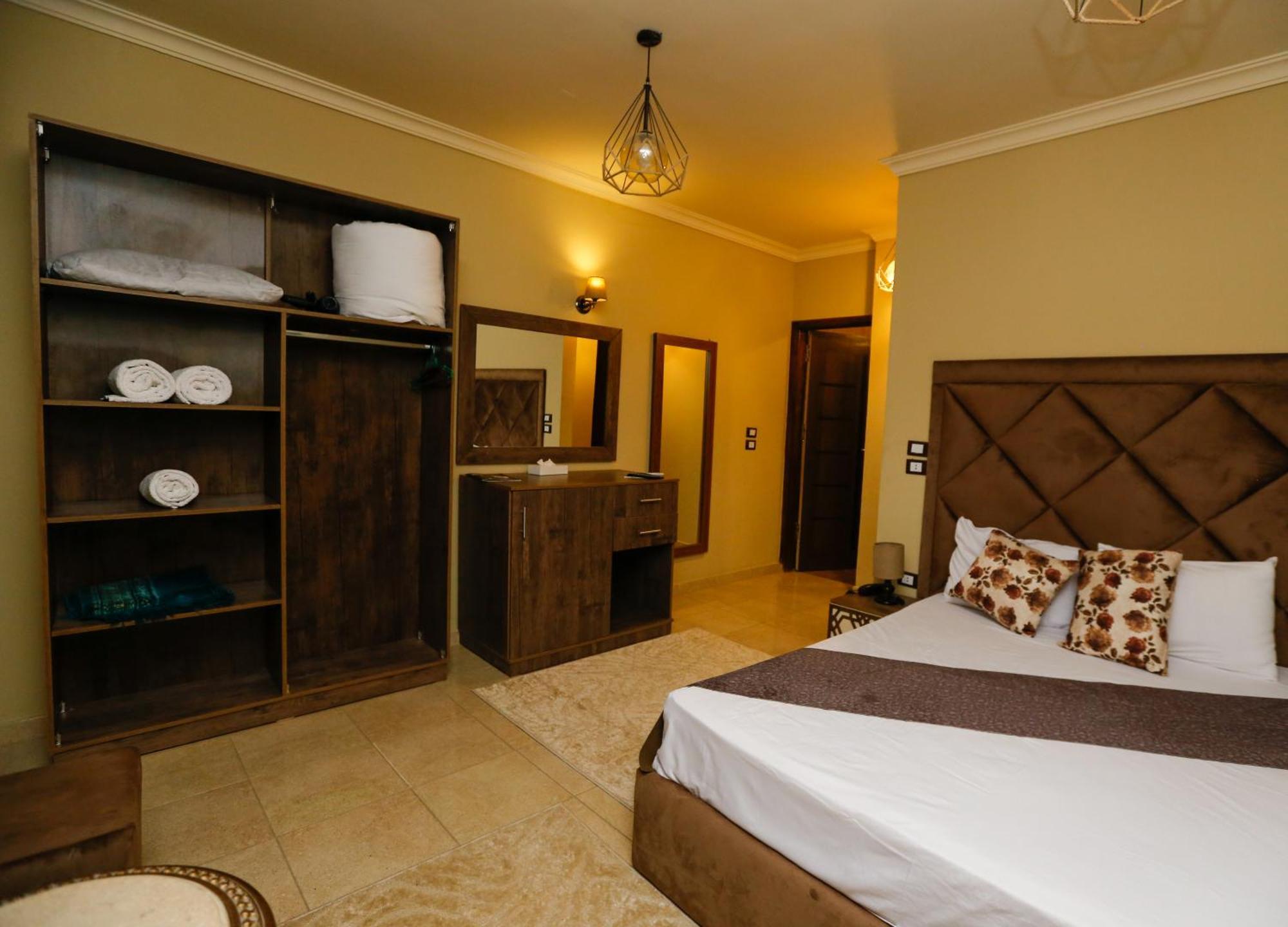 Master Pyramids Hotel Al Kawm al Akhdar エクステリア 写真